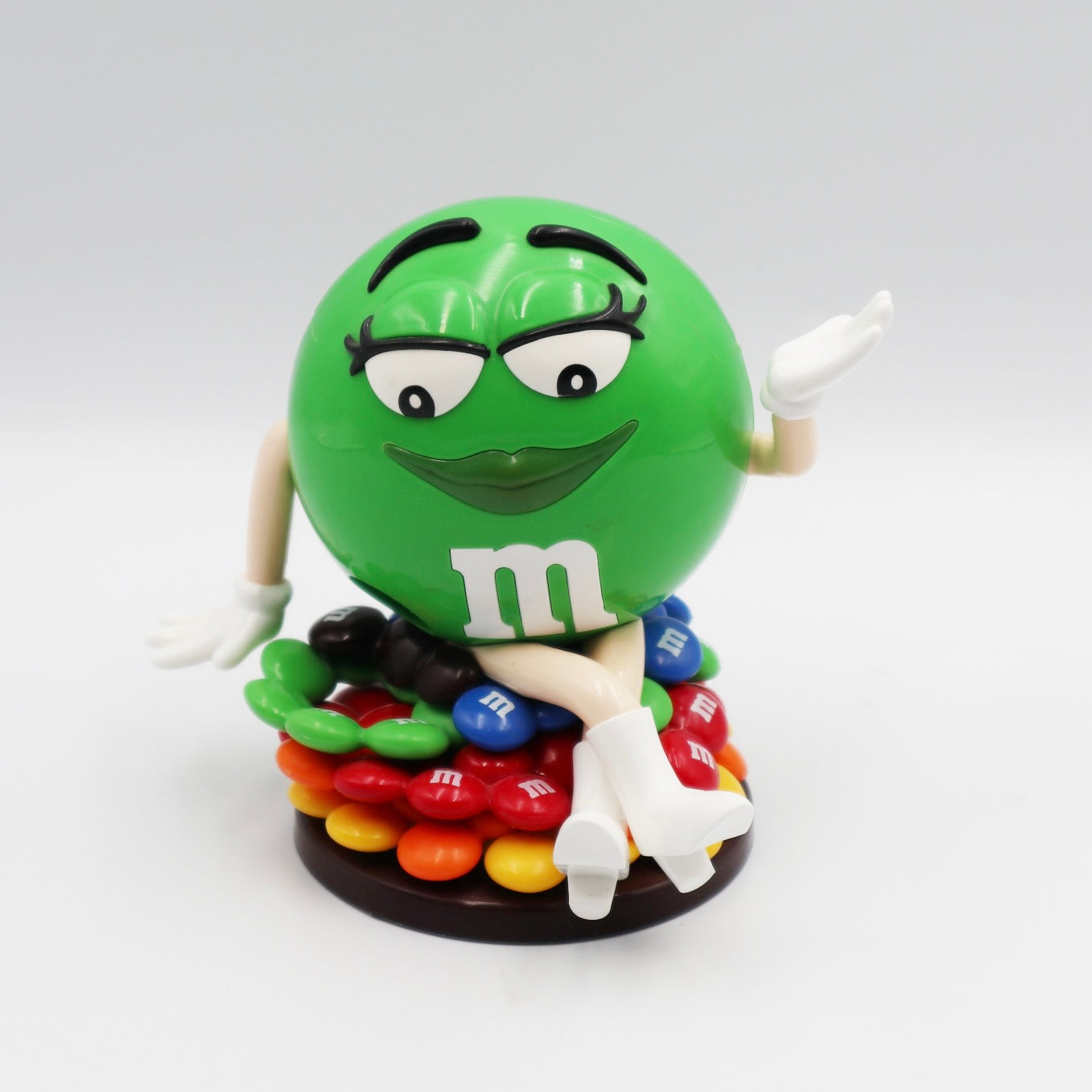 M&M Dispenser Green Girl Sitting 4” image 0
