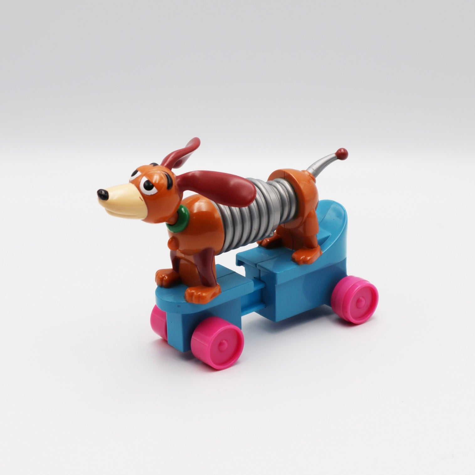McDonalds Toy Story 2 Slinky Dog Skateboard Figure 4.5" (1999)